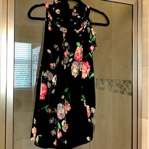 Beautifully lined floral blouse, barely warned..